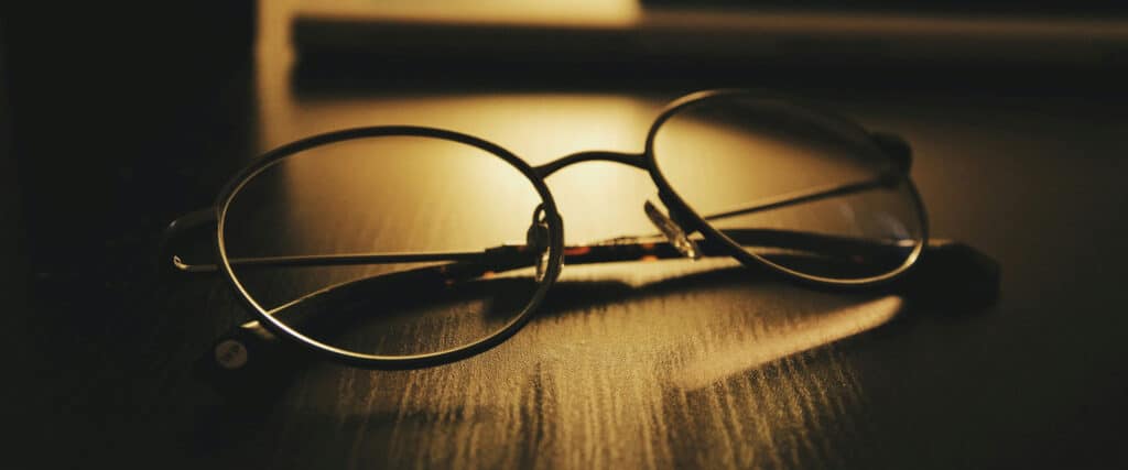 Eyeglasses on a table indicated website clarity